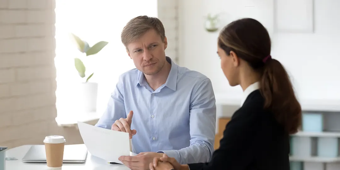 A mortgage adviser talking a client through her options