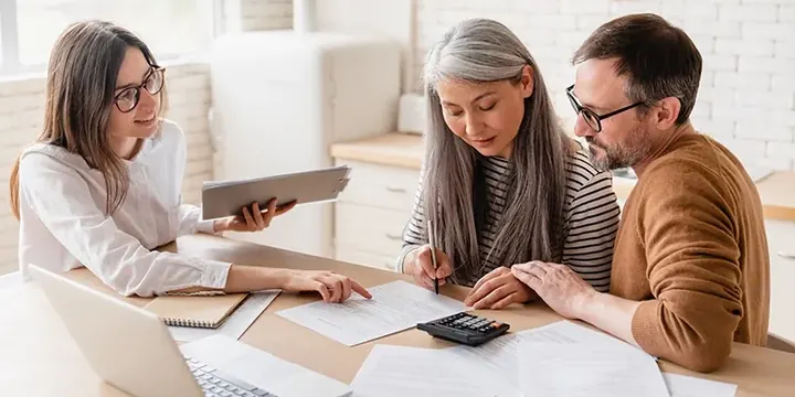 An adviser talking a couple through their options